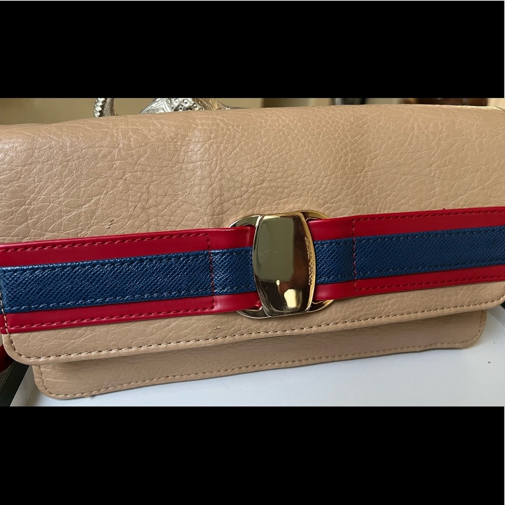 Ivan’s trump tan with red/blue with gold hardware